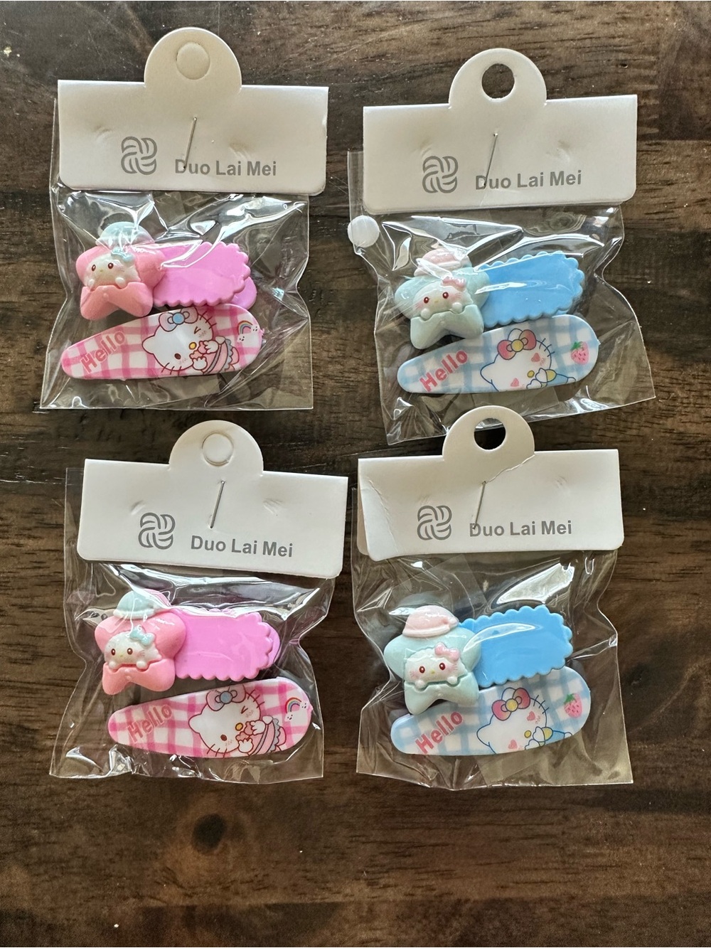 NWT Set of 4 Hello Kitty Child Size Hair Clips Barretts Pink & Blue